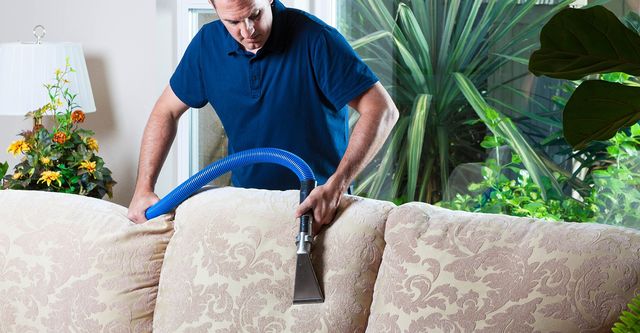 Can I clean my sofa at home or should I hire a professional?